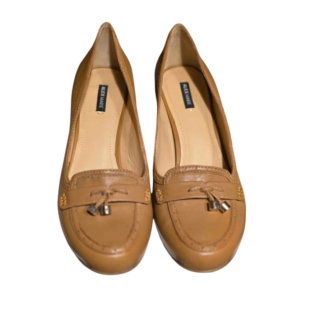 Alex Marie Leather Pumps Featuring a Round Toe, Tassel Accents